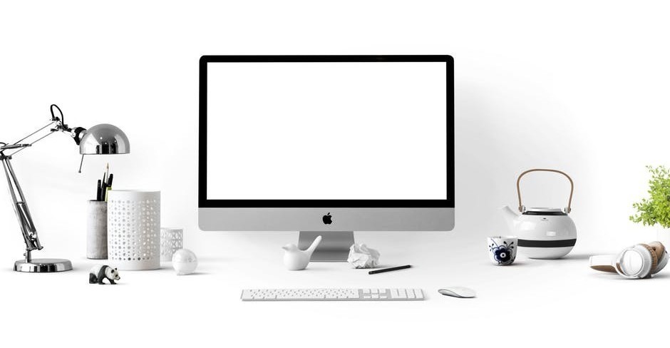 white computer and desk